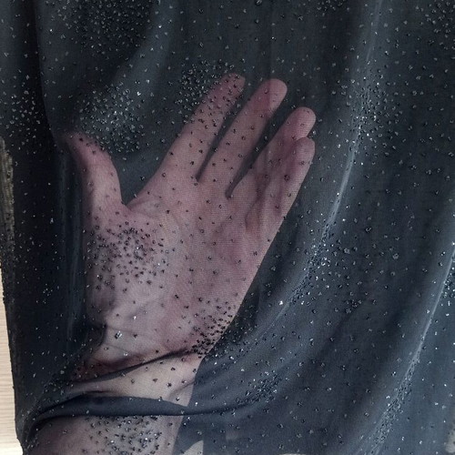 Black see through top with shimmer like new, medium to large size