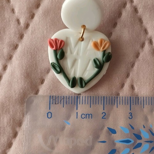 Heart-shaped earrings like new, plastic white and pink with flowers