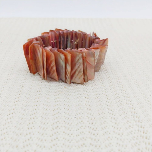 Pearl bracelet in coral color, stretch design with pearl tiles