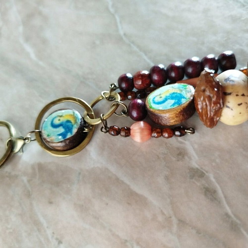 Purse charm keychain new, handmade with wood beads and almond shells