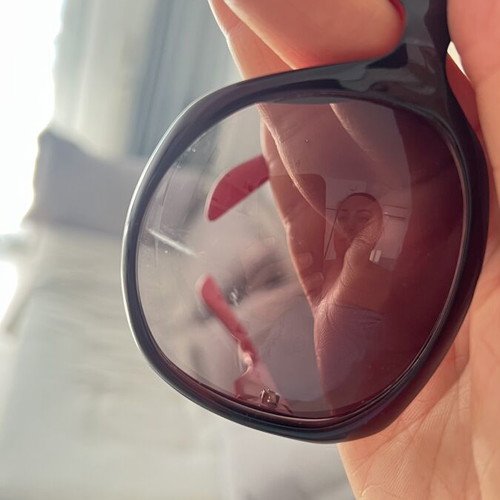 Christian Dior sunglasses used, black and red frame, lens scratched