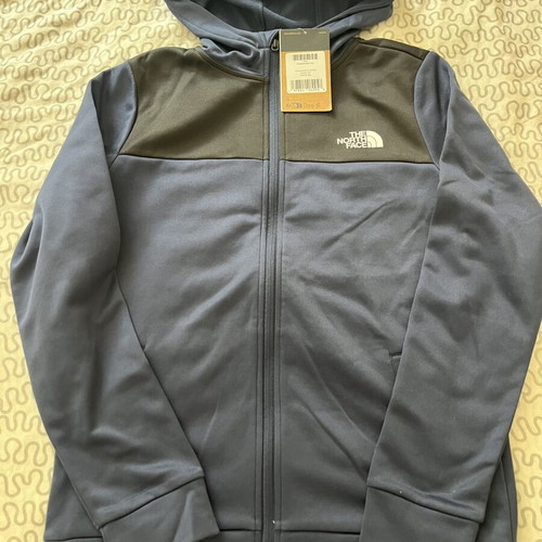 The North Face jacket brand new, 18-20 years old, black and blue