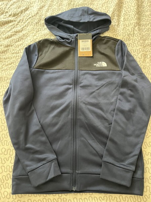 The North Face jacket brand new, 18-20 years old, black and blue