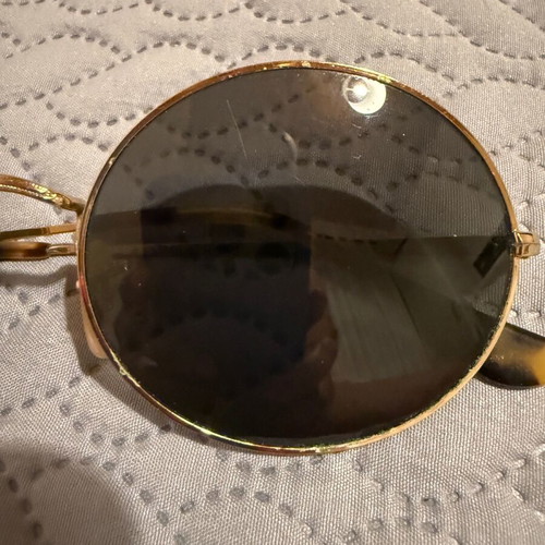 Ray-Ban Oval sunglasses used with gold frame and gray lenses