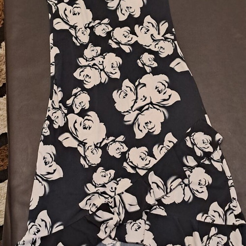 Midi dress used, black and white, asymmetrical with ruffles