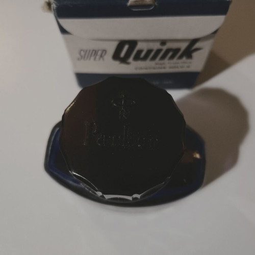 Permanent blue ink "PARKER - SUPER QUINK", in a glass bottle in its box, I think it is full.