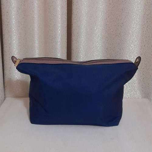 Axel toiletry bag navy blue with brown details