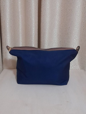 Axel toiletry bag navy blue with brown details