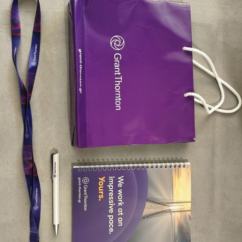 Grant Thornton promotional set with notebook, pen, lanyard, pouch