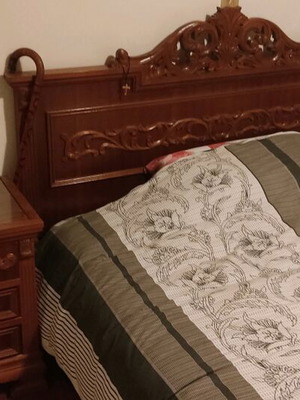 Double carved vintage bed used without mattress