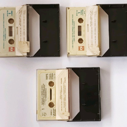 Three used Greek pop music cassettes from the 80s