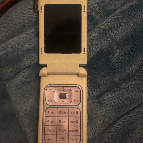 Nokia 7390 used pink with leather cover, collectible