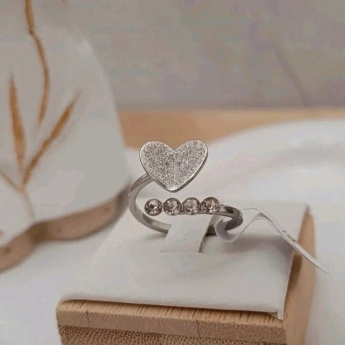 Steel ring with heart new, silver color