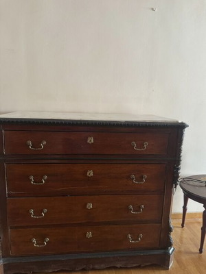 Classic wooden dresser with marble top