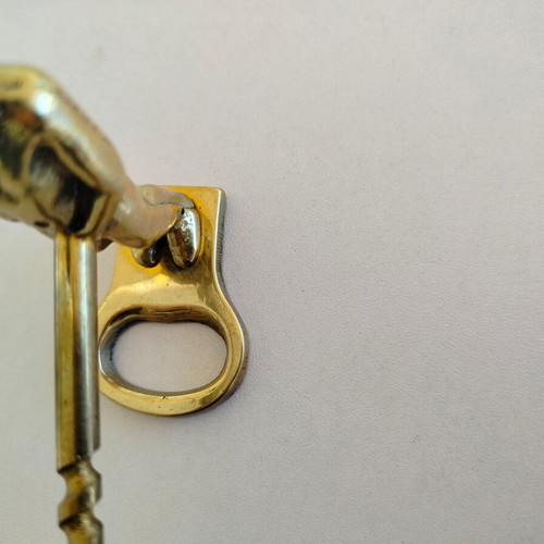 Brass corkscrew opener used with minor metal wear