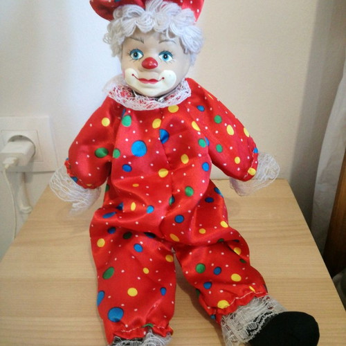 Porcelain clown used, 49cm tall, with clothes