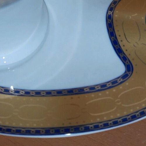 Limoge coffee cup set used, 2 cups with Hermes feather design