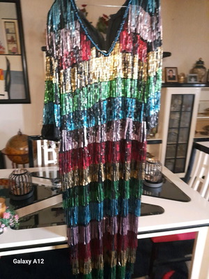 Long embroidered track dresses like new by Petros from 1980s-90s