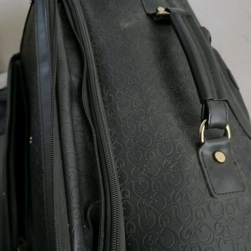 Guess suitcase used with missing front emblem