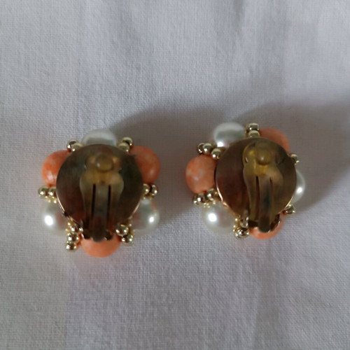 Vintage earrings used in simon white color with golden beads