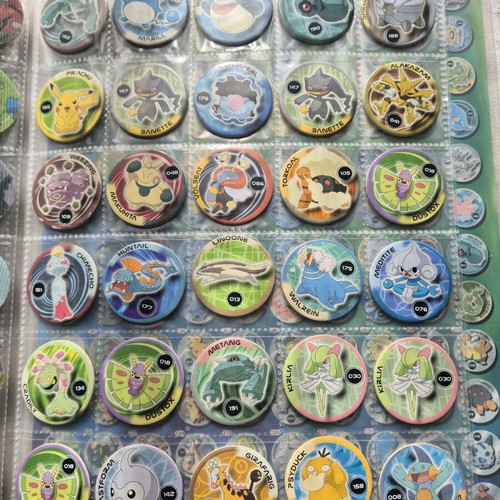 Pokemon collectible caps 213 pieces like new