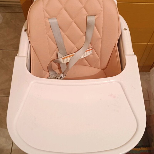 Kikaboo high chair like new with leather seat and wooden legs