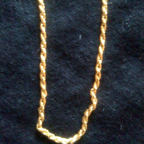 Necklace and earrings like new gold-colored