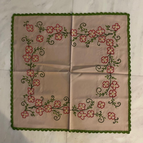 Handmade table linen with embroidery and lace used