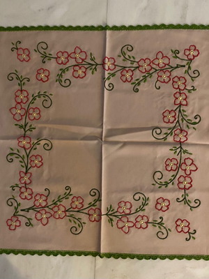 Handmade table linen with embroidery and lace used