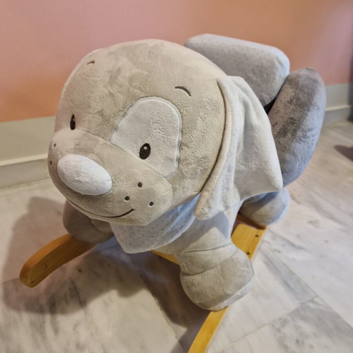 Rocking dog plush toy like new
