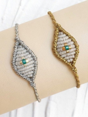 Βραχιόλι μάτι μακραμέ ασημί και λευκό με σταυρό από χάντρες miyuki καινούργιο