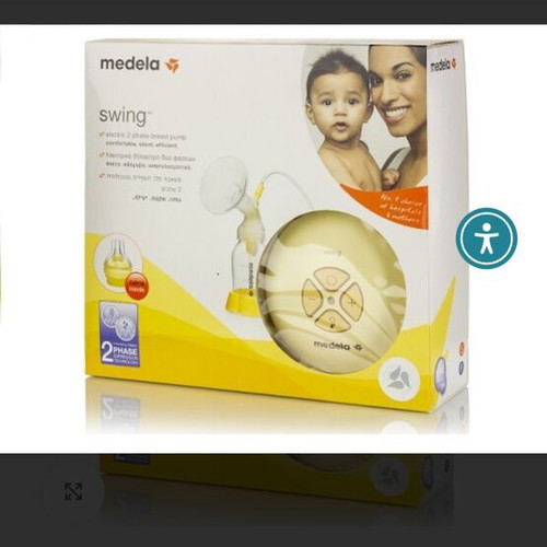 Medela Swing breast pump used with box and storage bag