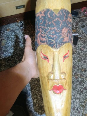 Chinese mask with fabric decoration