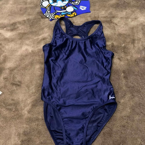 Arena sports swimsuit and cap like new, size 7-8 years