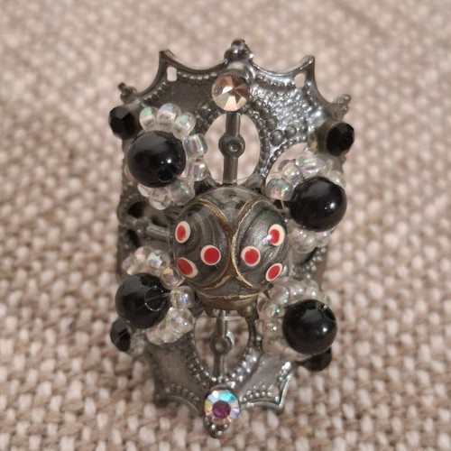 Long ring used, black and silver
