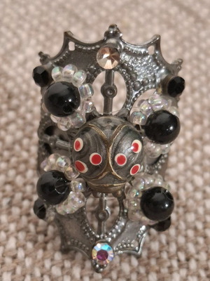 Long ring used, black and silver