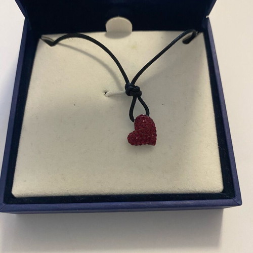 Swarovski pendant like new with leather cord and red heart with crystals