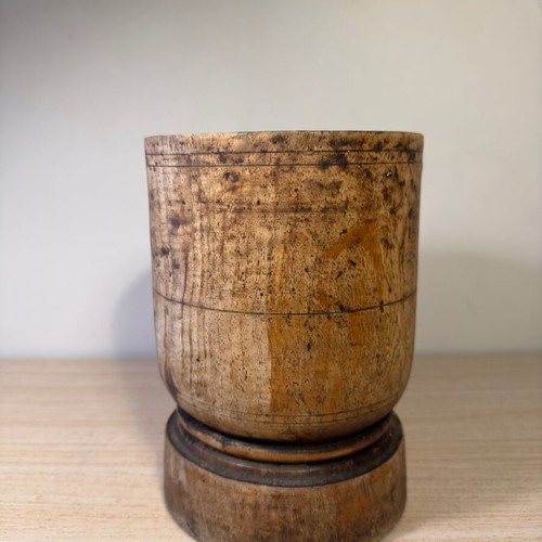 Rustic handmade wooden mortar used