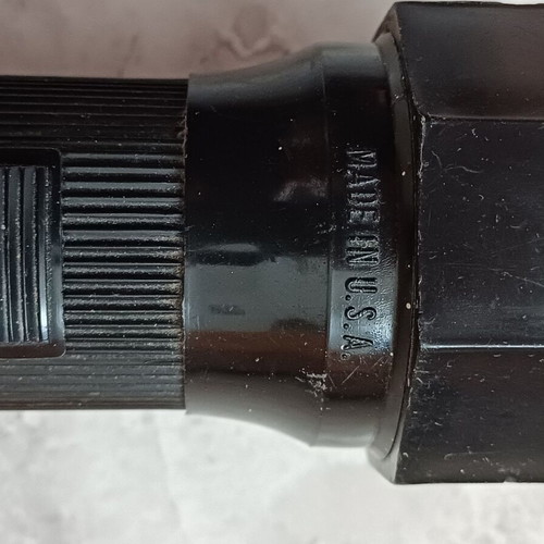 Plastic flashlight used, simple, works with 2 DD batteries
