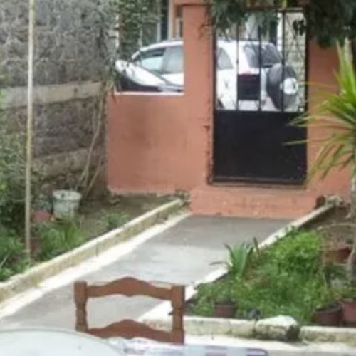 Stone detached house with plot within settlement in Lesvos