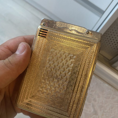 Tobacco case with petrol lighter used