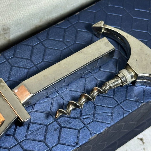 Vintage bottle opener and corkscrew anchor design used