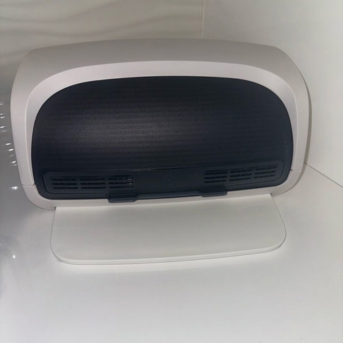 Tupperware bread box new with cutting tray
