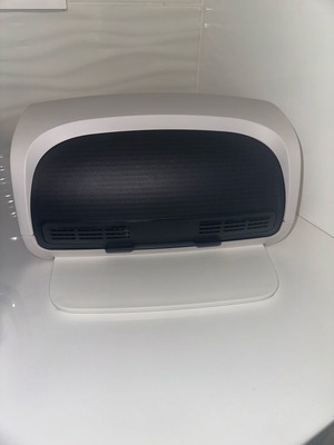 Tupperware bread box new with cutting tray