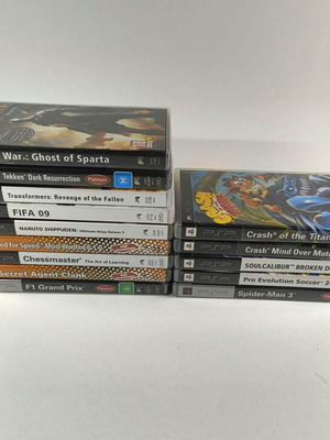 PSP game cases pack of 14 including God of War, Crash, Soulcalibur