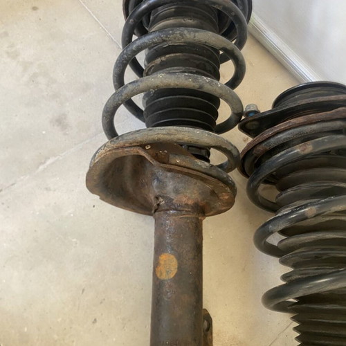 Ford Escort front shock absorbers complete with springs and mounts used