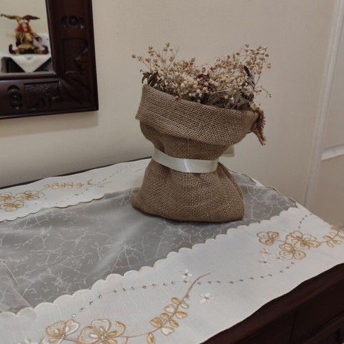 Decorative sack with dried flowers like new