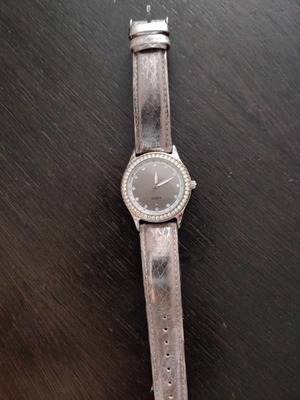 Avon silver women's watch used in good condition