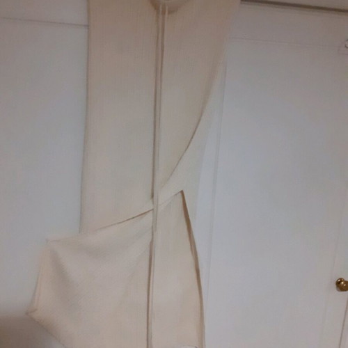 Long skirt like new, ecru knit fabric with side slit and drawstring