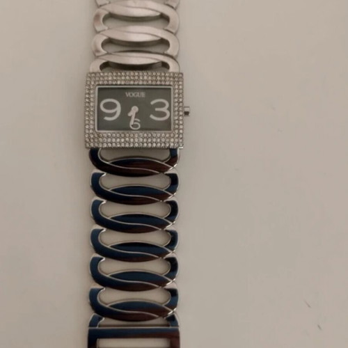 Vogue women's watch like new with rectangular case and crystals